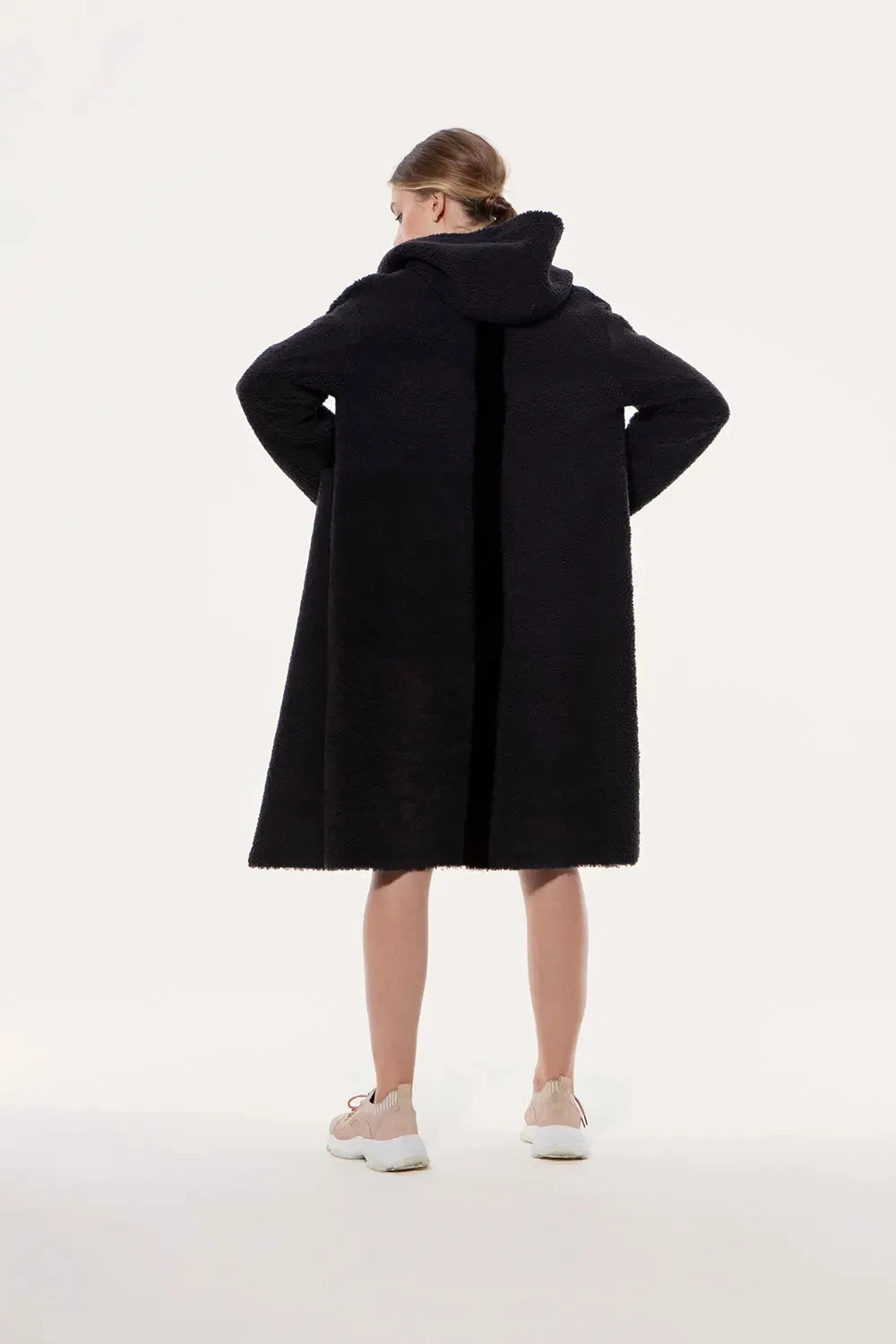 Reversible hooded sheepskin coat