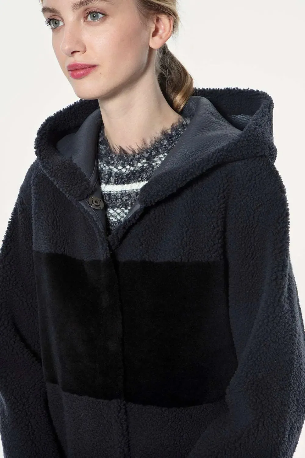 Reversible hooded sheepskin coat